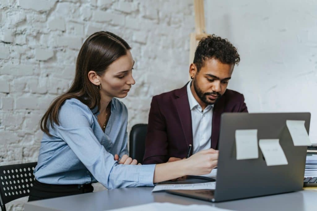 A man and woman checking finances