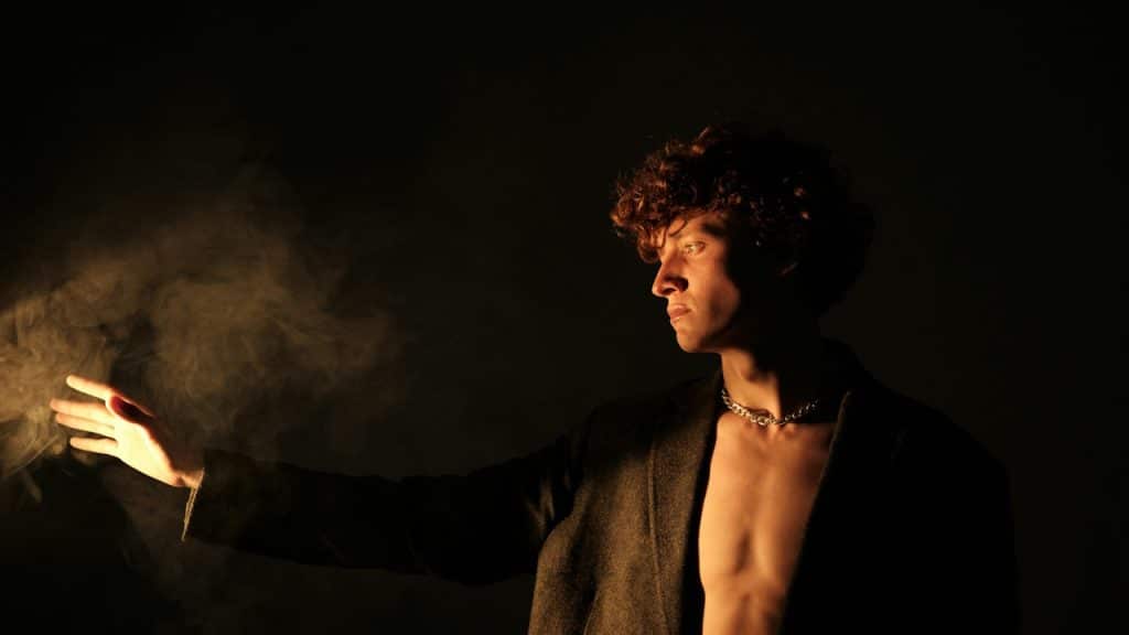 A man standing in dark