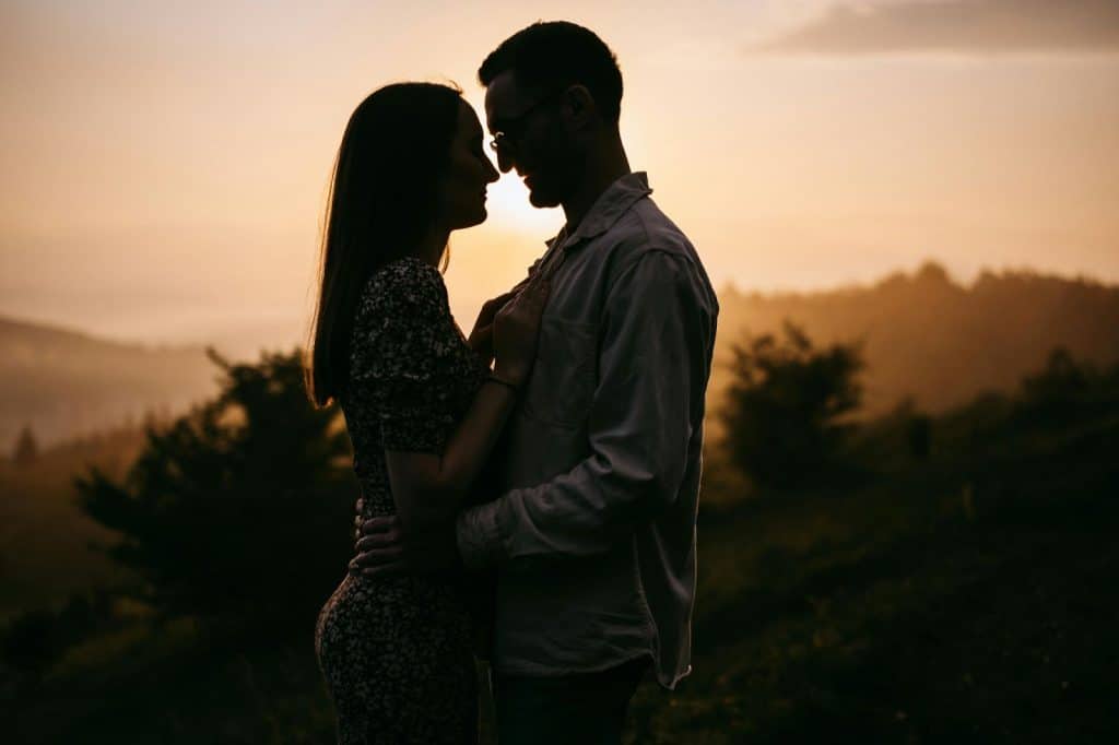 A man and woman at the sunset