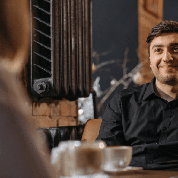 A Man in Black Long Sleeve Shirt