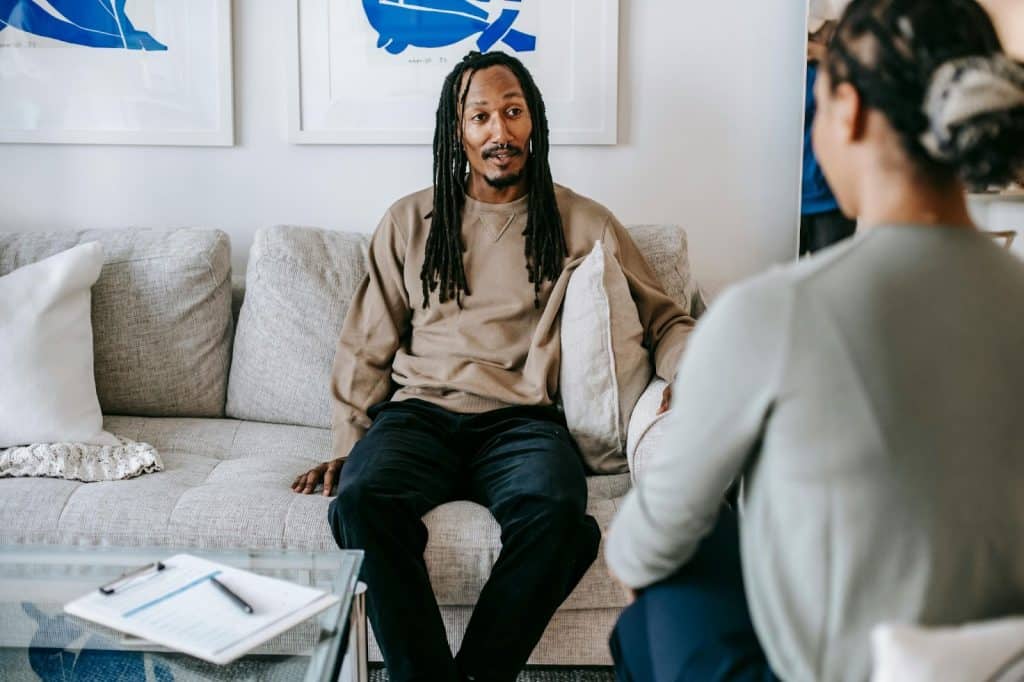 A man listening to woman