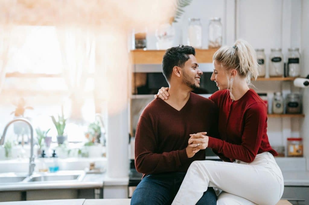 A man and woman holding hands