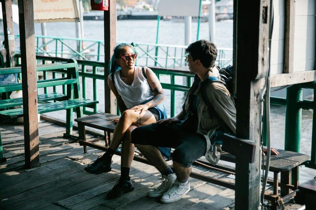 A man and woman talking