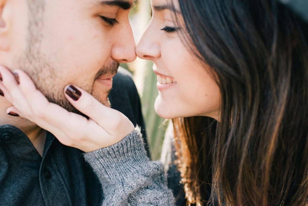 A man and woman close to each other