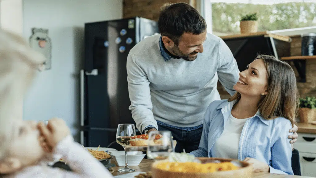 A husband greeting his wife