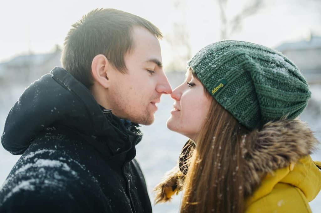 A man and woman kissing
