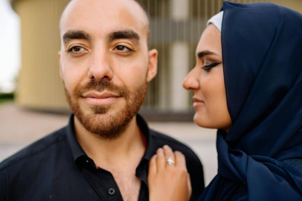 A woman beside the man
