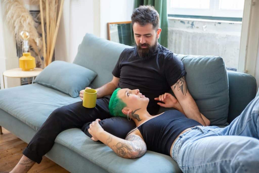 A man and woman smiling at each other