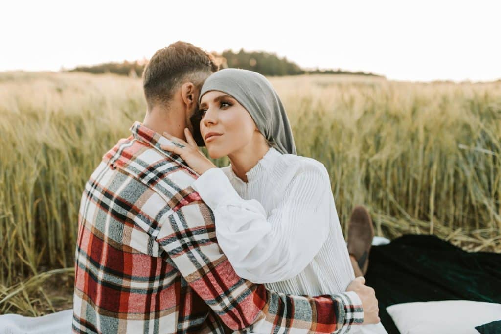 A man and woman hugging
