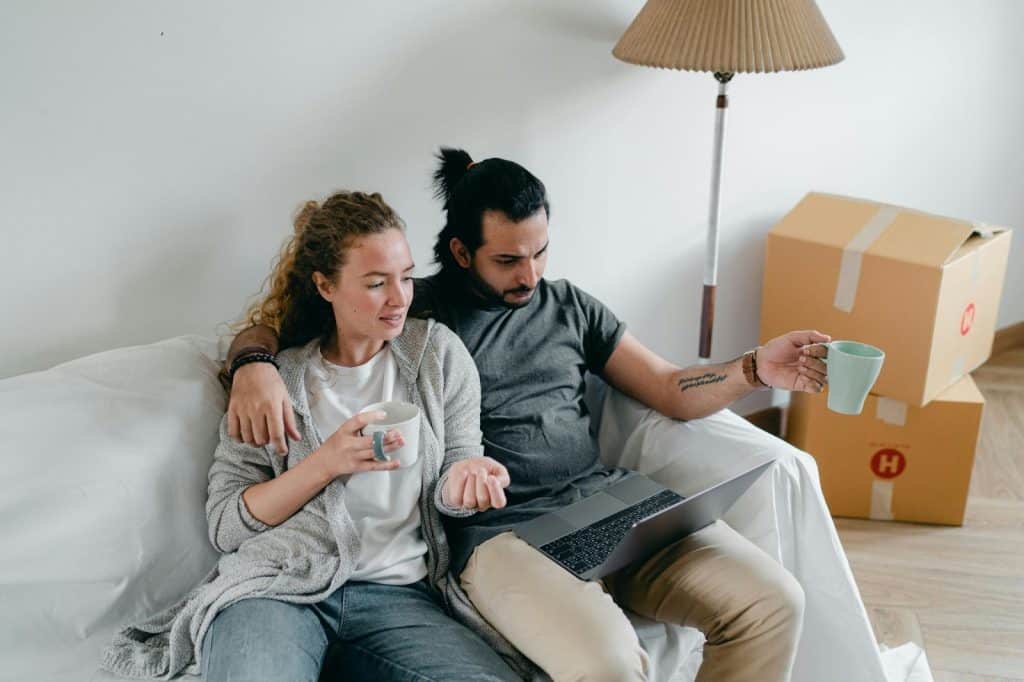 A man and woman at the couch