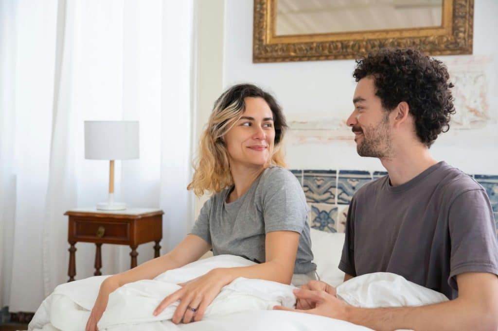 A man and woman looking at each other