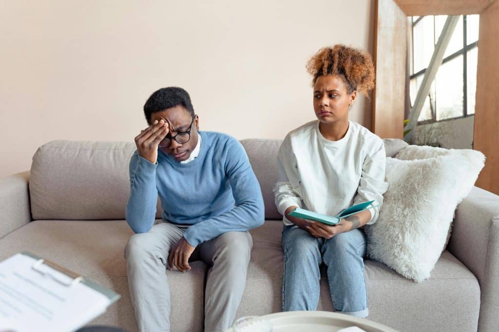A woman shared an opinion and a man listening to her