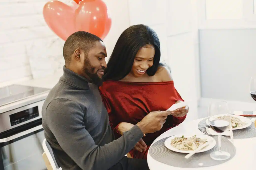 A man and woman having dinner together