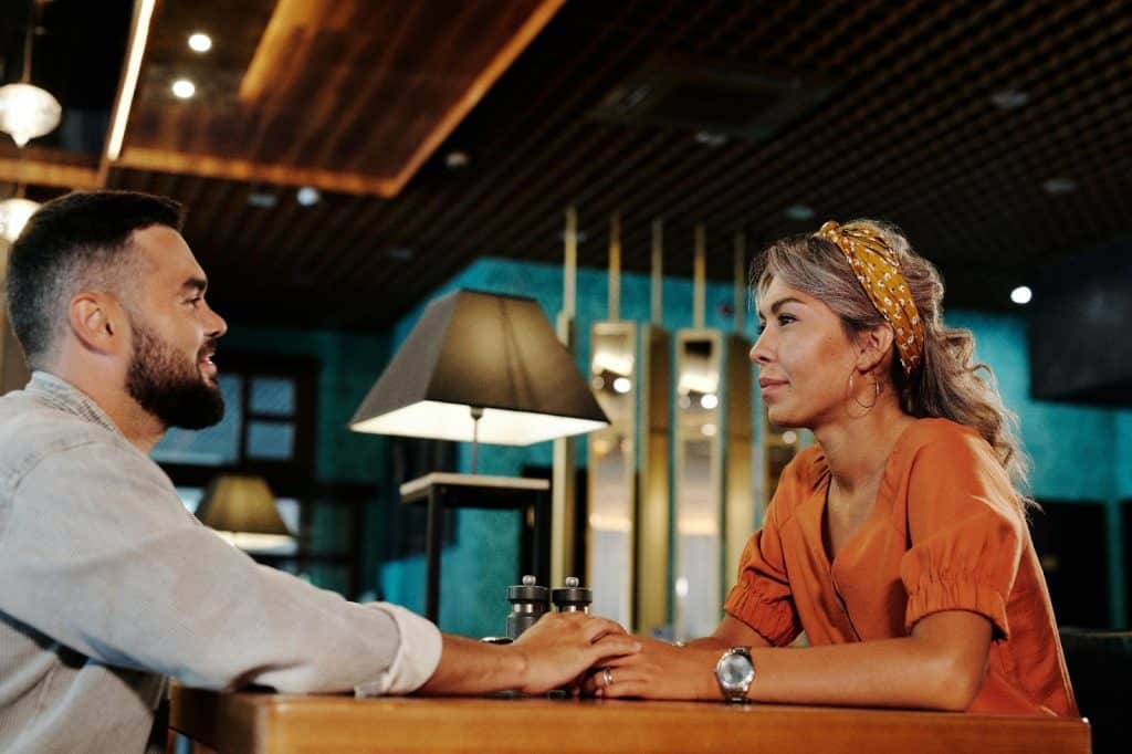 A man listening to woman