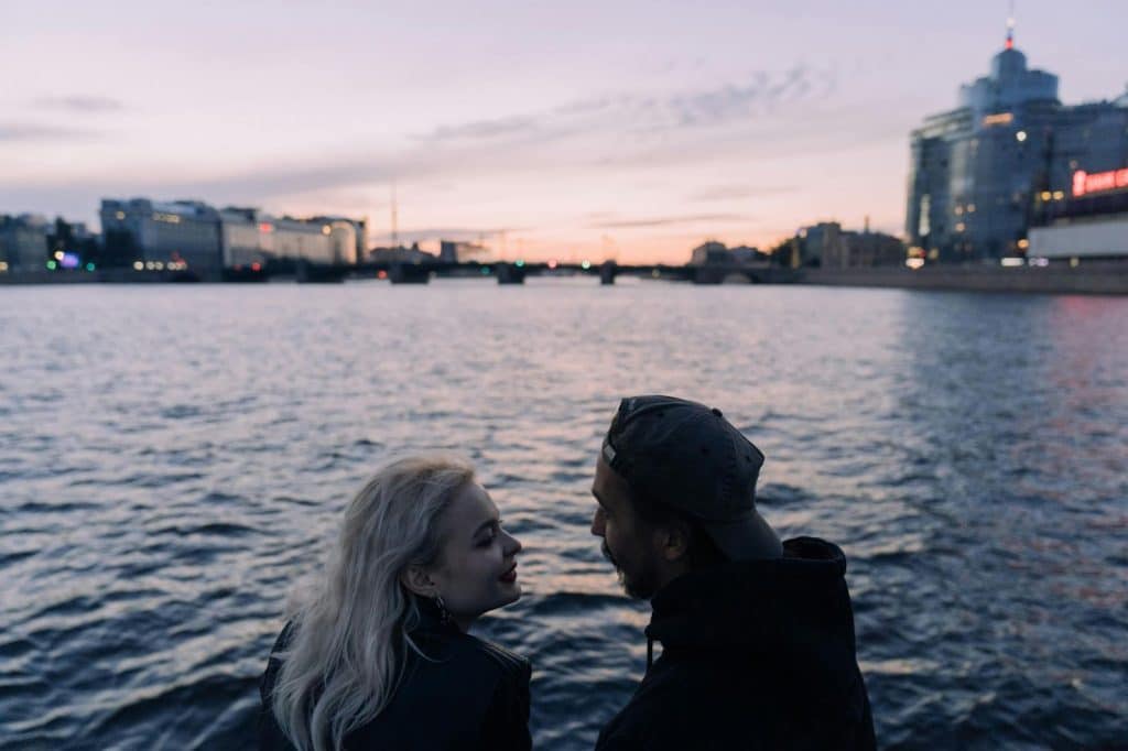 A man and woman having a romantic moment