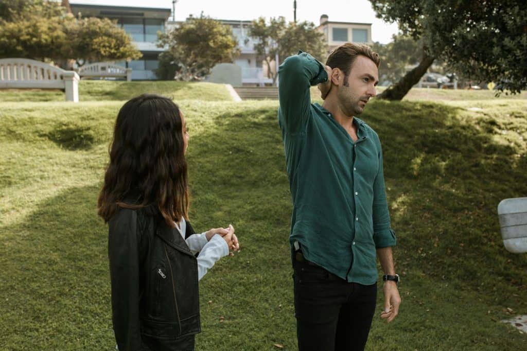 A man looking annoyed to woman
