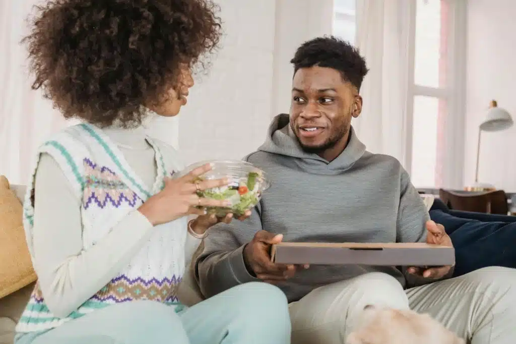 A man prepared a meal for a woman