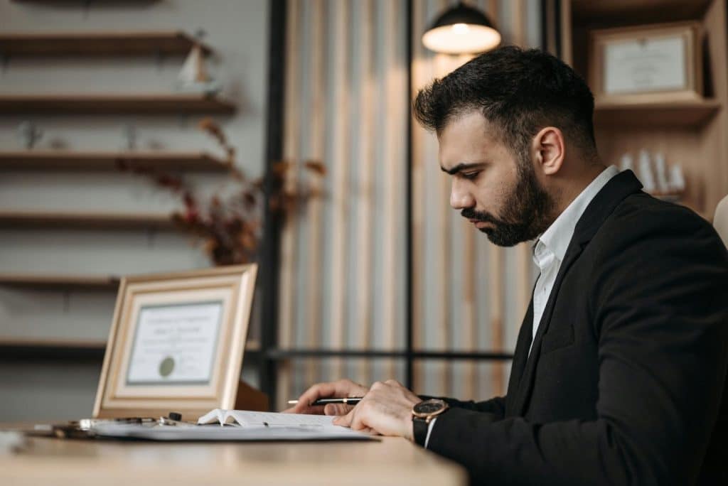 A man writing something