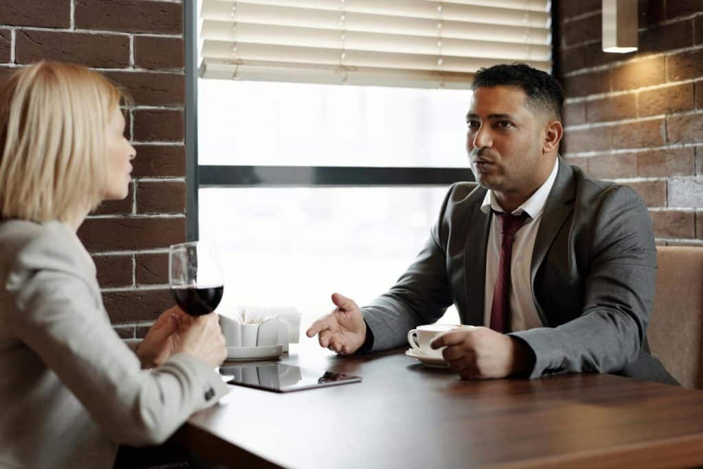 A man and woman discussing something