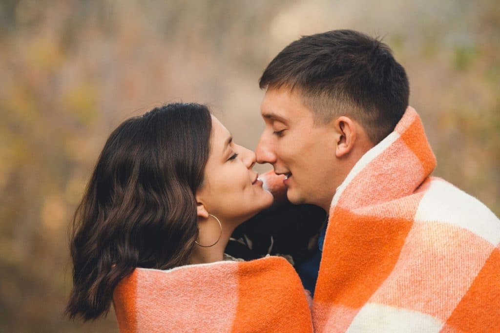 A man and woman hugging