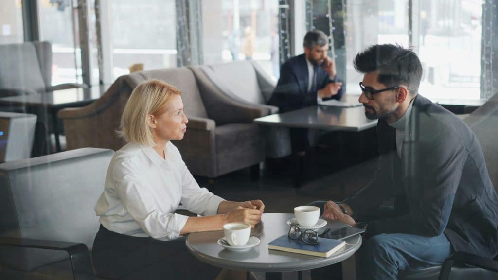 A man and woman talking
