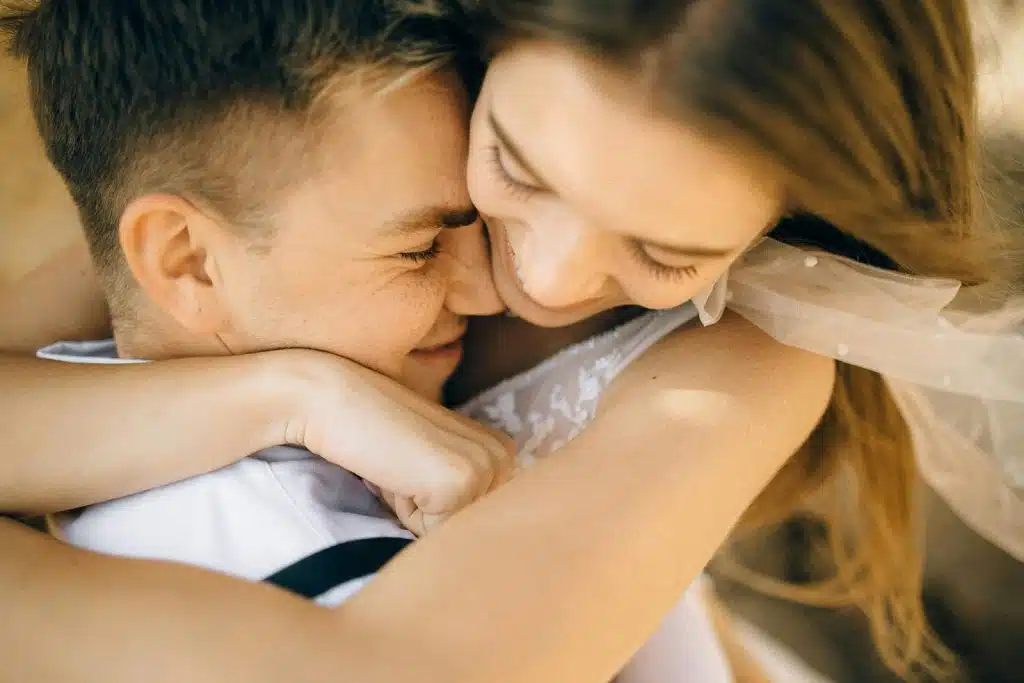 Woman hugging a man
