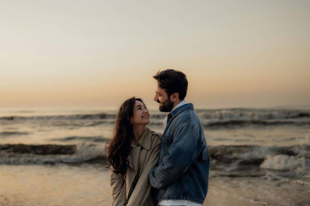 A man and woman at the beach