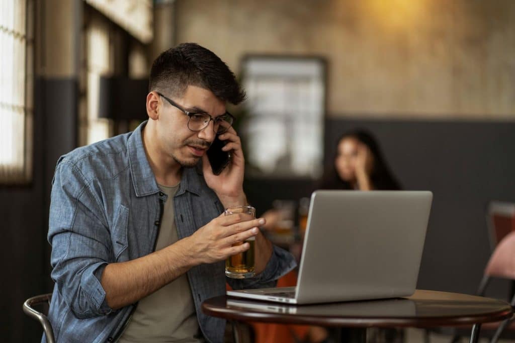 A man talking someone on the phone