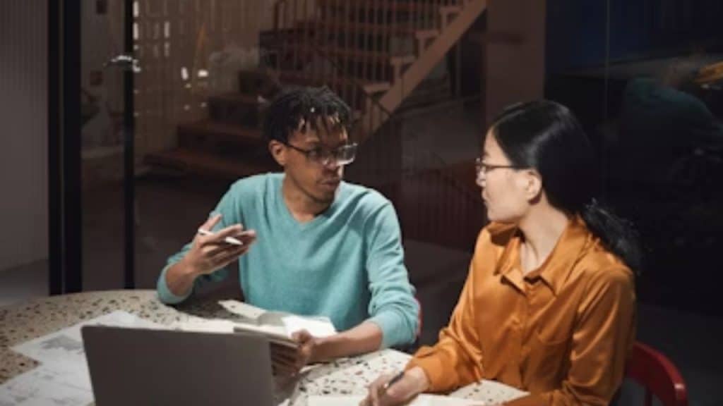 Couple arguing over a calendar filled with events