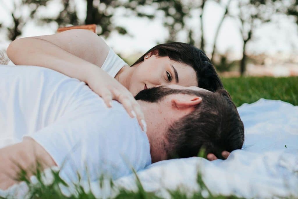 A man and woman facing each other