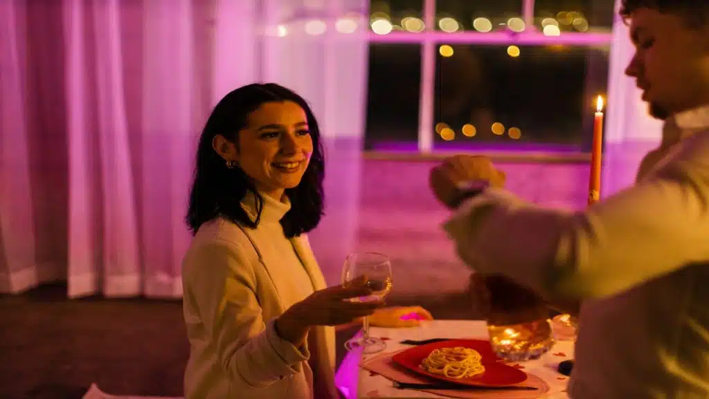 A couple on a romantic at-home dinner