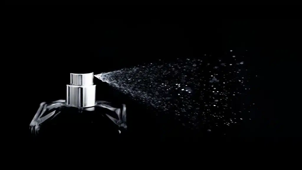 A perfume being sprayed