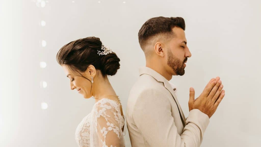 A man and a woman standing next to each other.