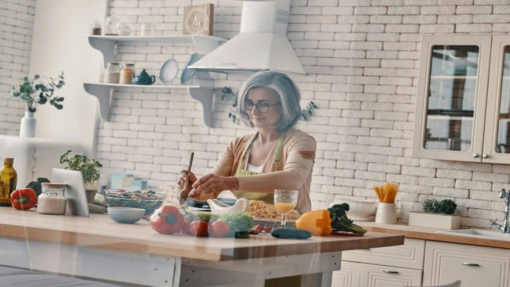 A woman cooking by herself
