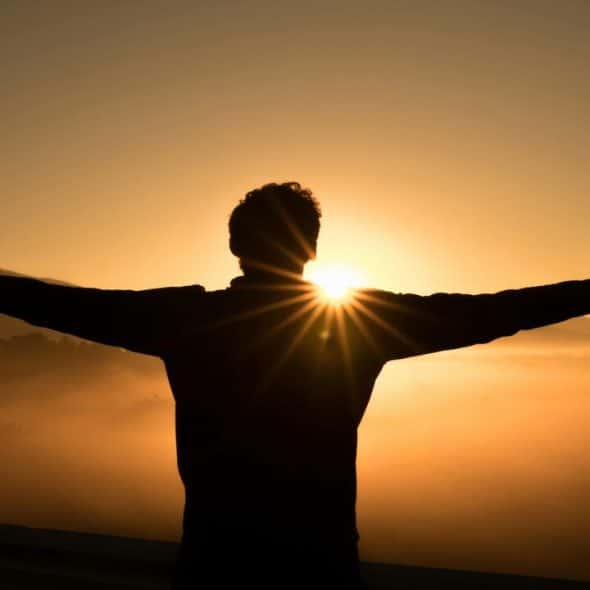 Silhouette of a man at sunset
