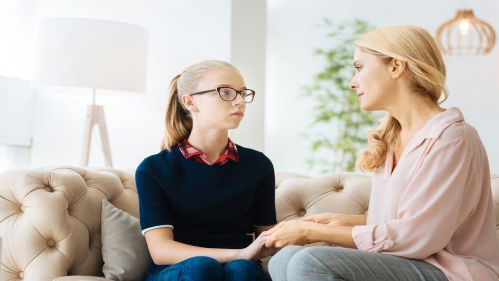 A mom talking to her daughter