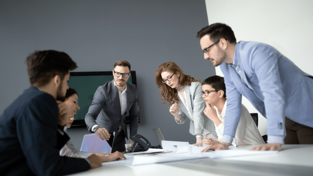 A man leading a business meeting