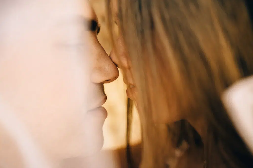 Close Up Photo of a a Couple Kissing