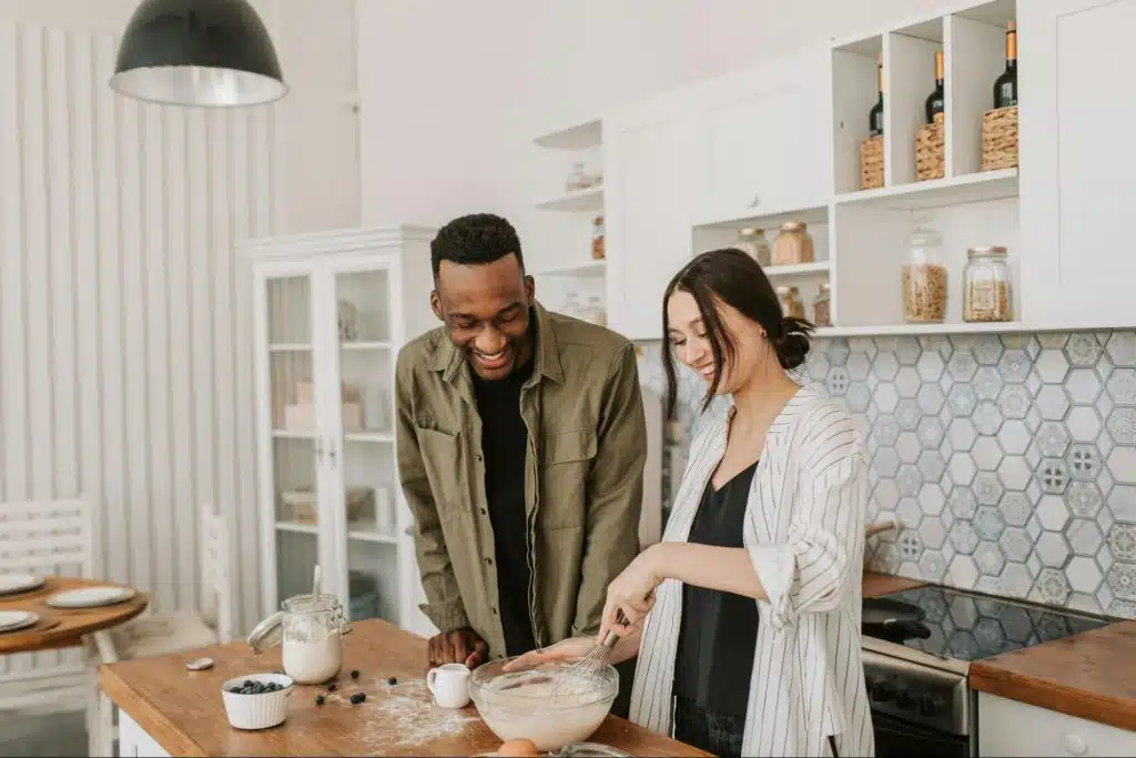 A man assisting a woman