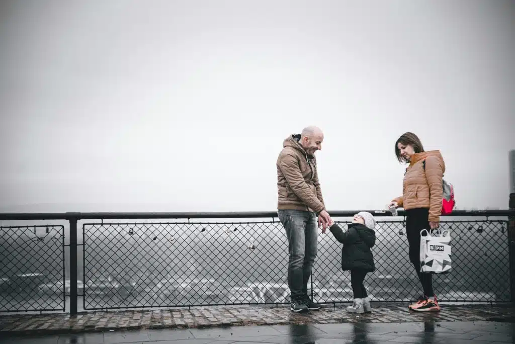 The couple is spending time with their child.