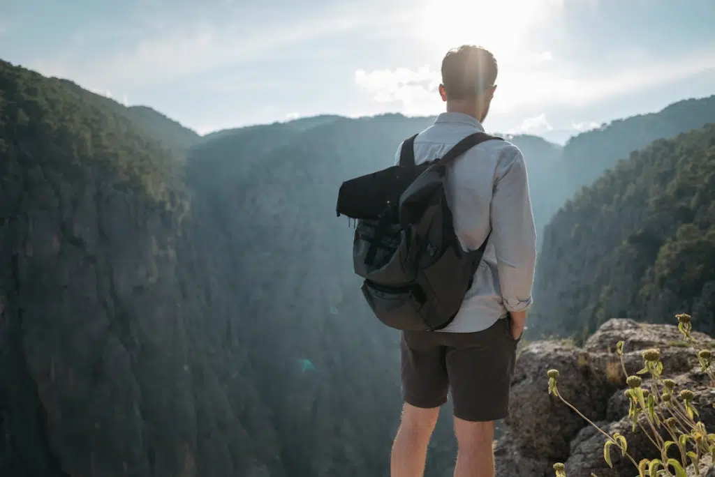 Back Photo of a Man in Mountain