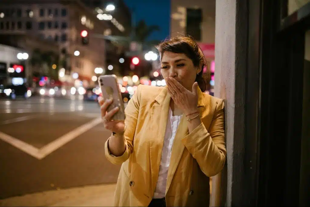 A lady holding a phone