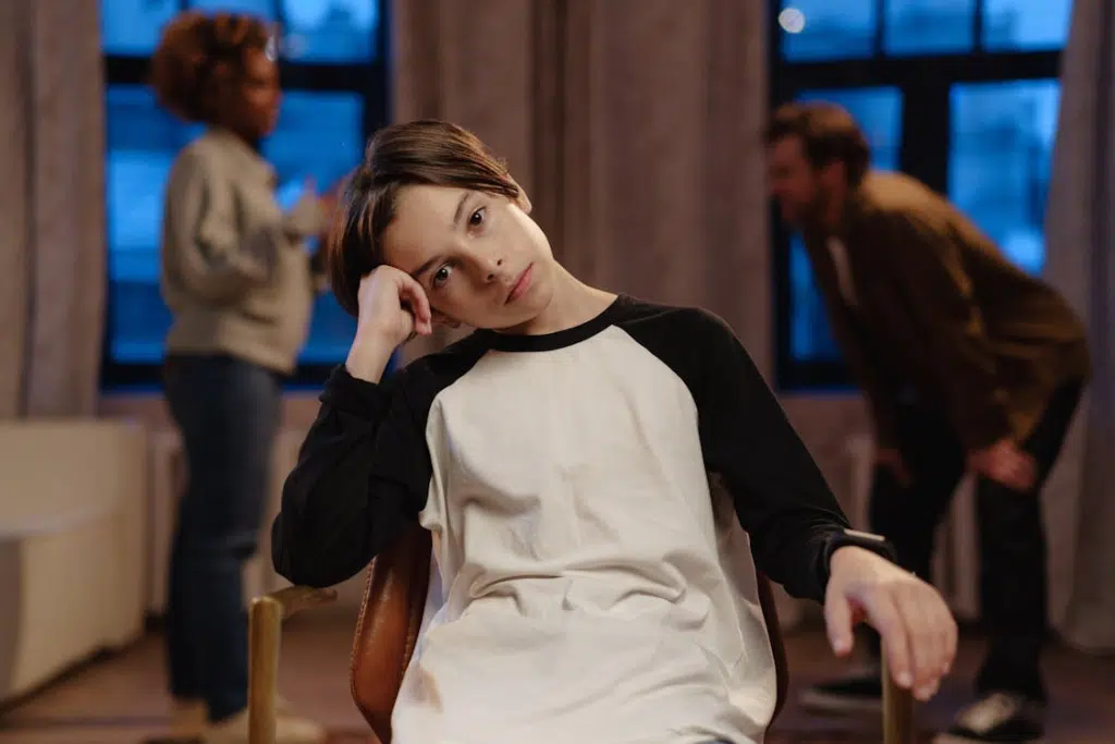 A boy sitting on a chair