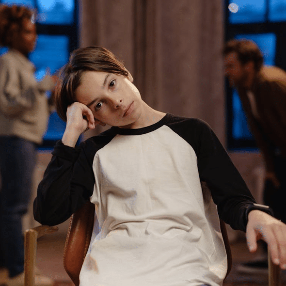 A boy sitting on a chair