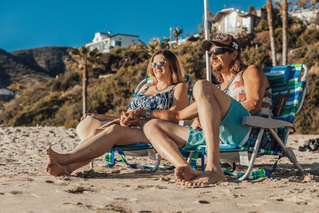 A Couple Sitting on the Shore