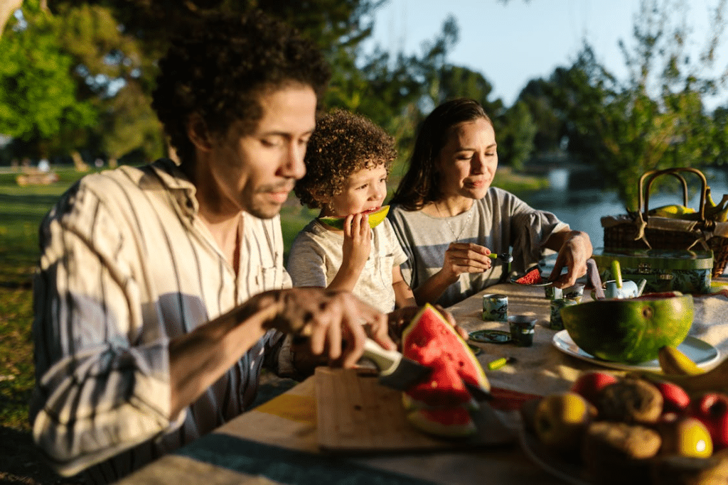 A Family Having a Picnic During Day Time
