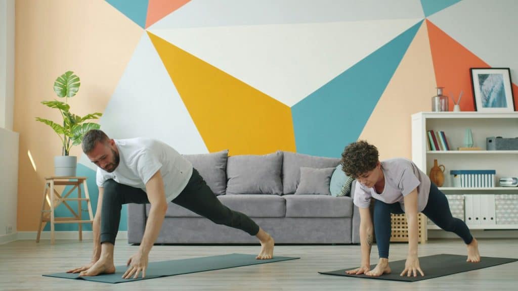 A couple doing yoga together