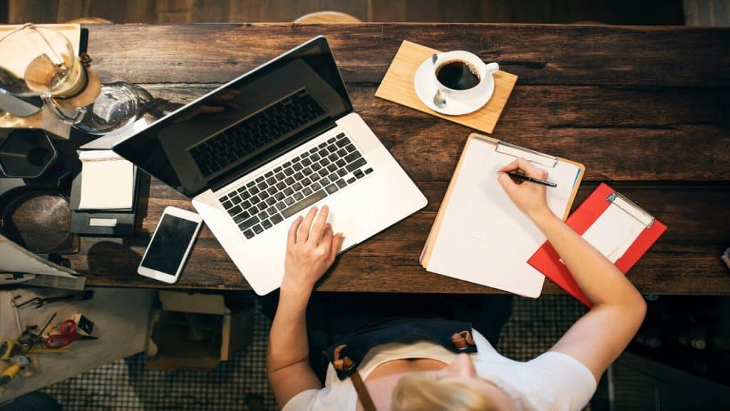 A woman working at a cafe