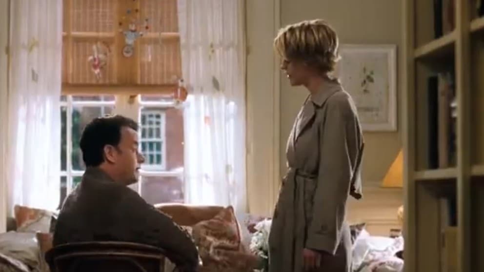 A man and woman talking 