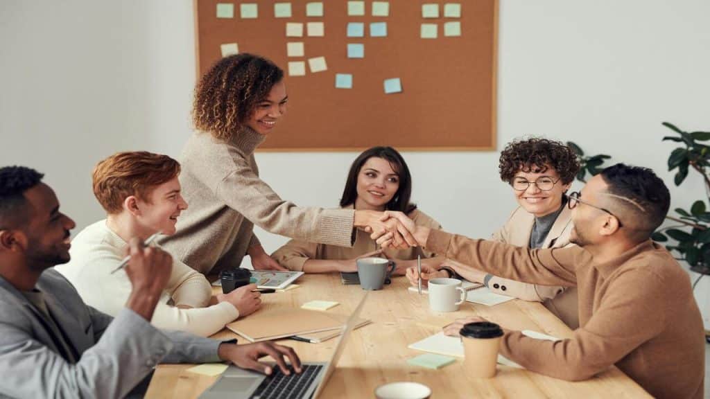 Colleagues shaking hands